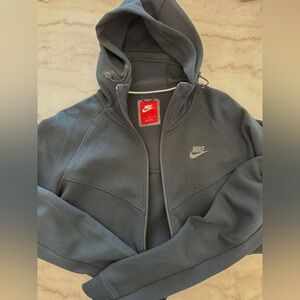 Women’s black zip up Nike Tech hoodie